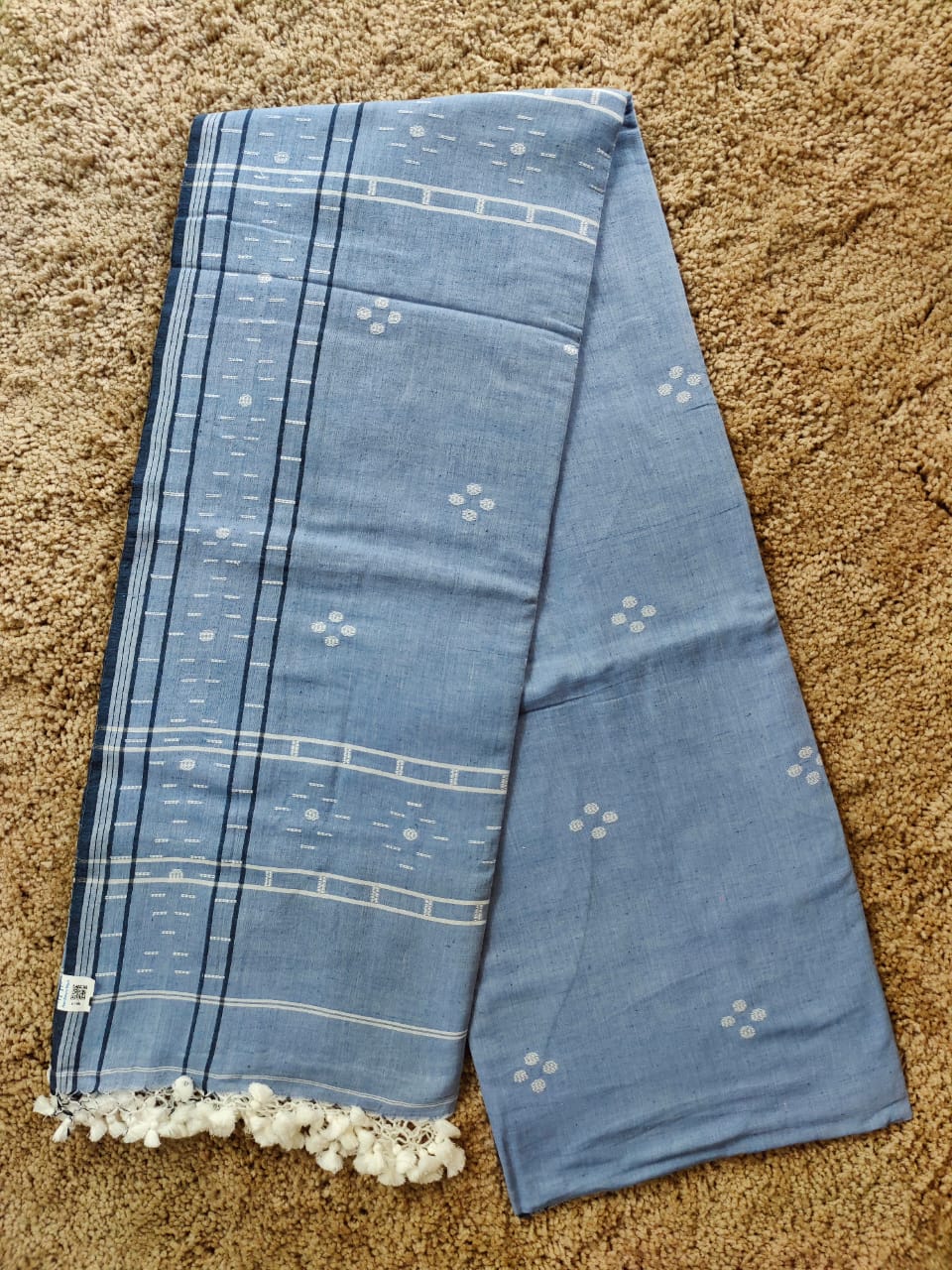 Sky blue cotton Jamdani saree with navy blue border