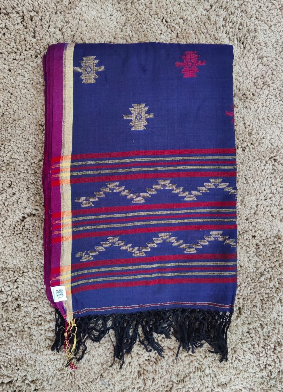 Blue cotton Jamdani saree with red and yellow motifs