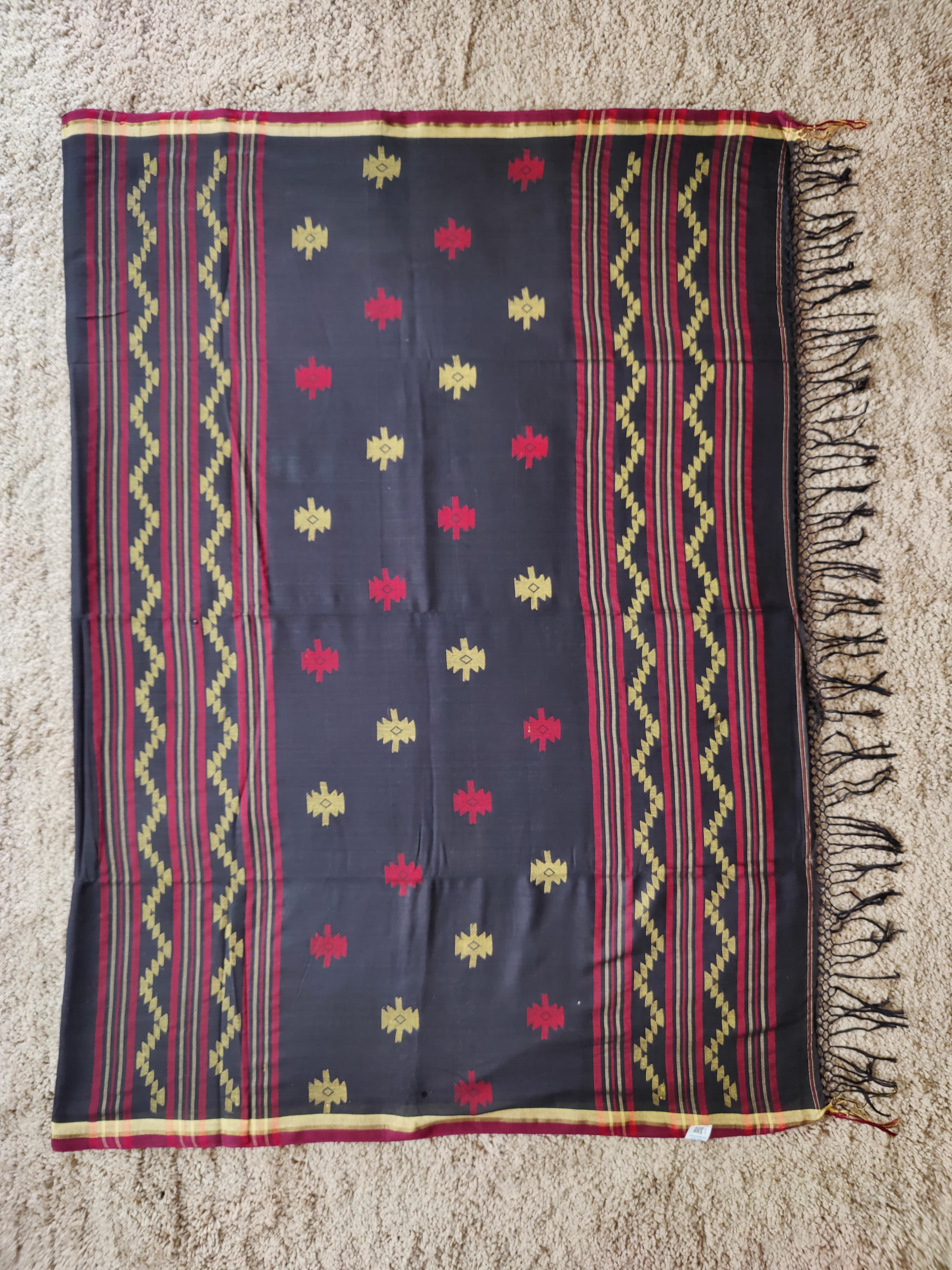 Black cotton Jamdani saree with red and yellow motifs