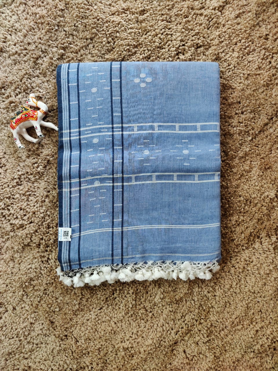 Sky blue cotton Jamdani saree with navy blue border