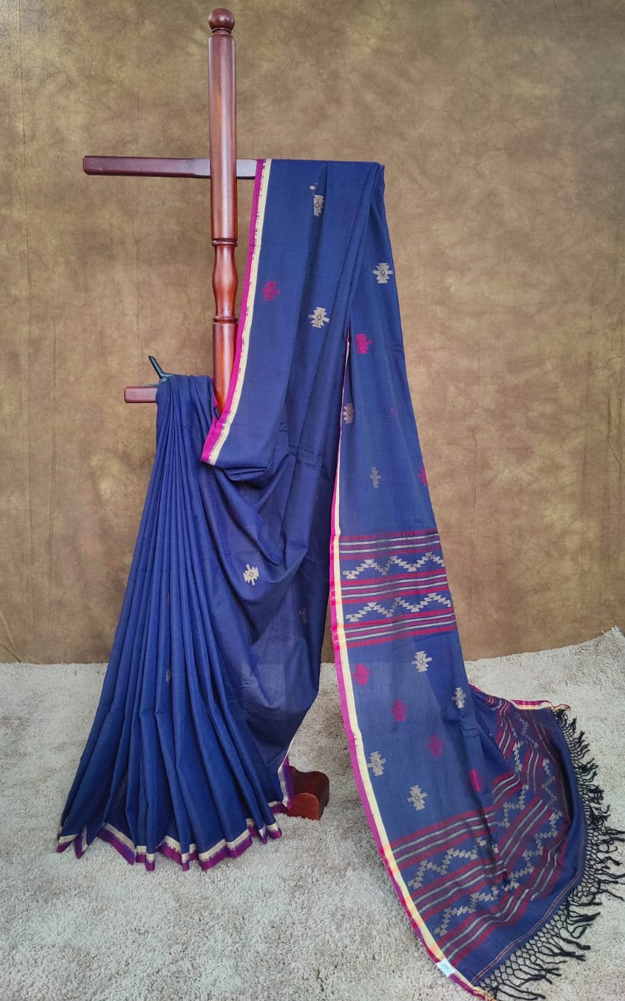 Blue cotton Jamdani saree with red and yellow motifs