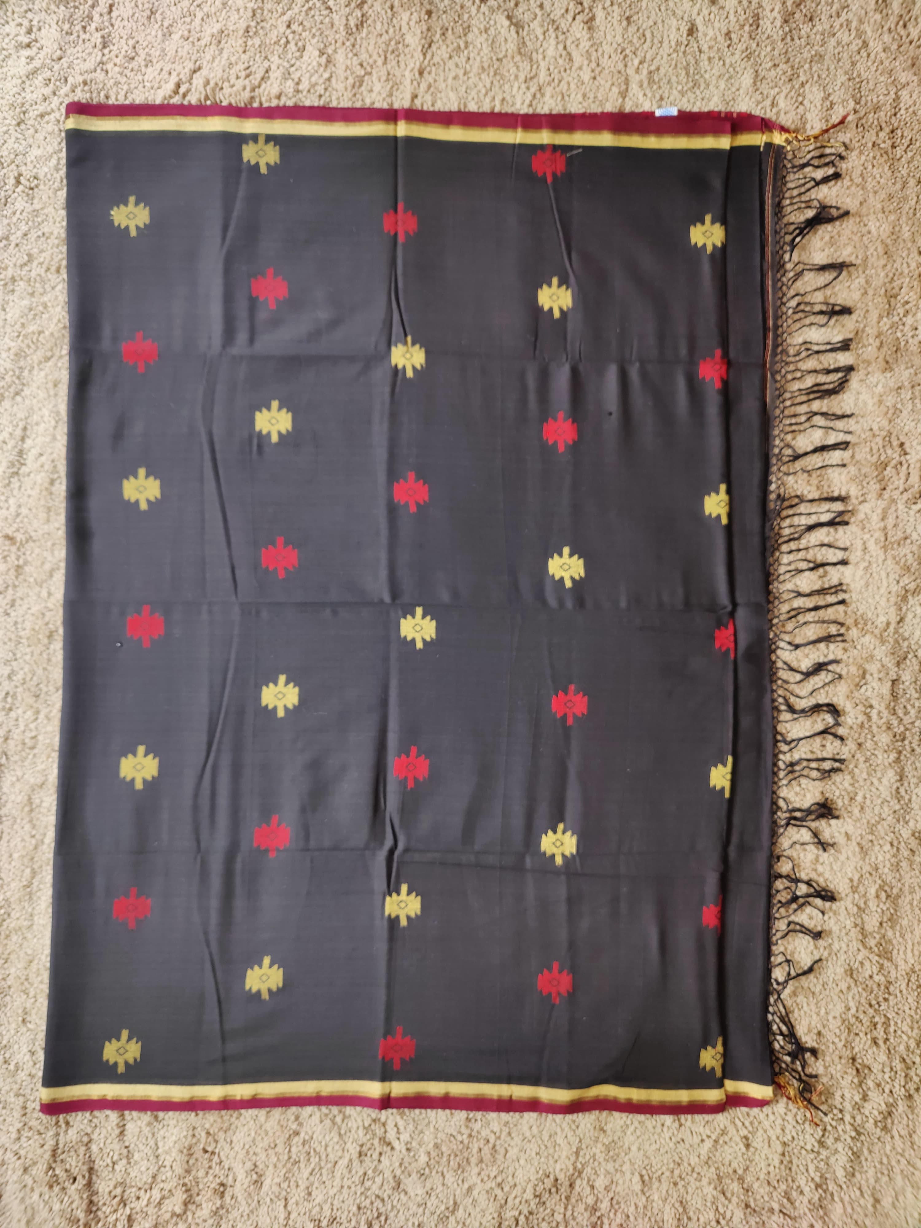 Black cotton Jamdani saree with red and yellow motifs