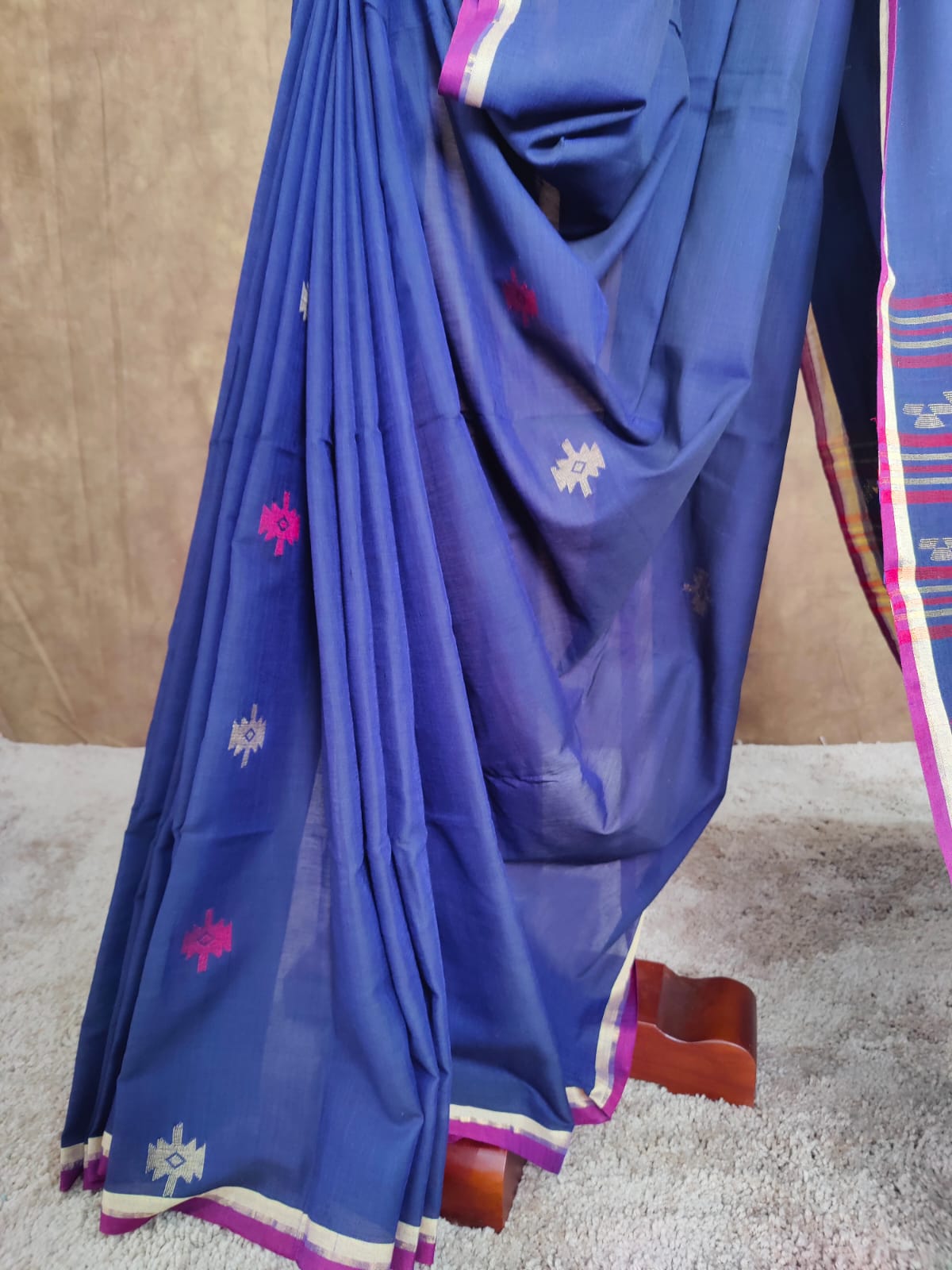 Blue cotton Jamdani saree with red and yellow motifs