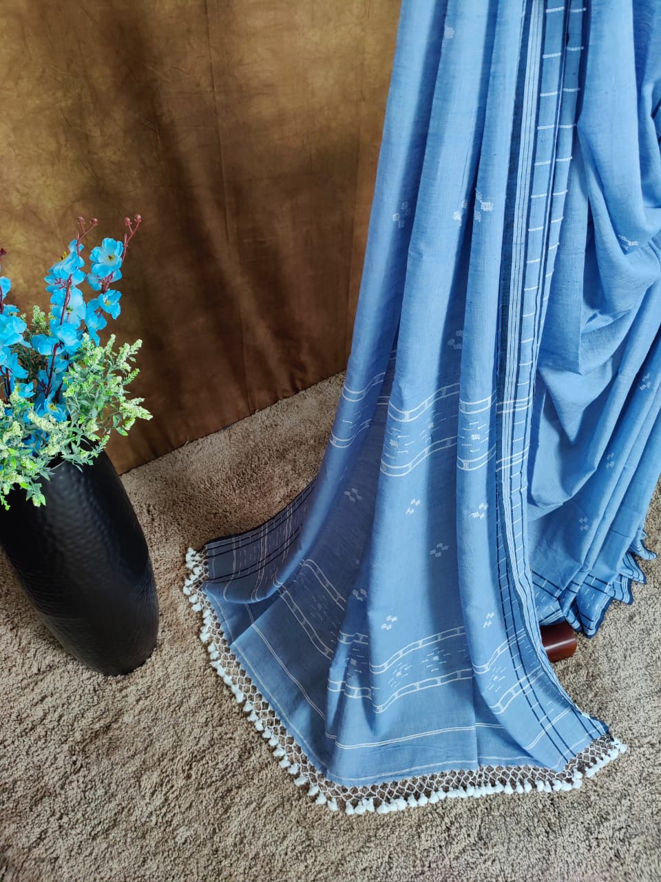 Sky blue cotton Jamdani saree with navy blue border