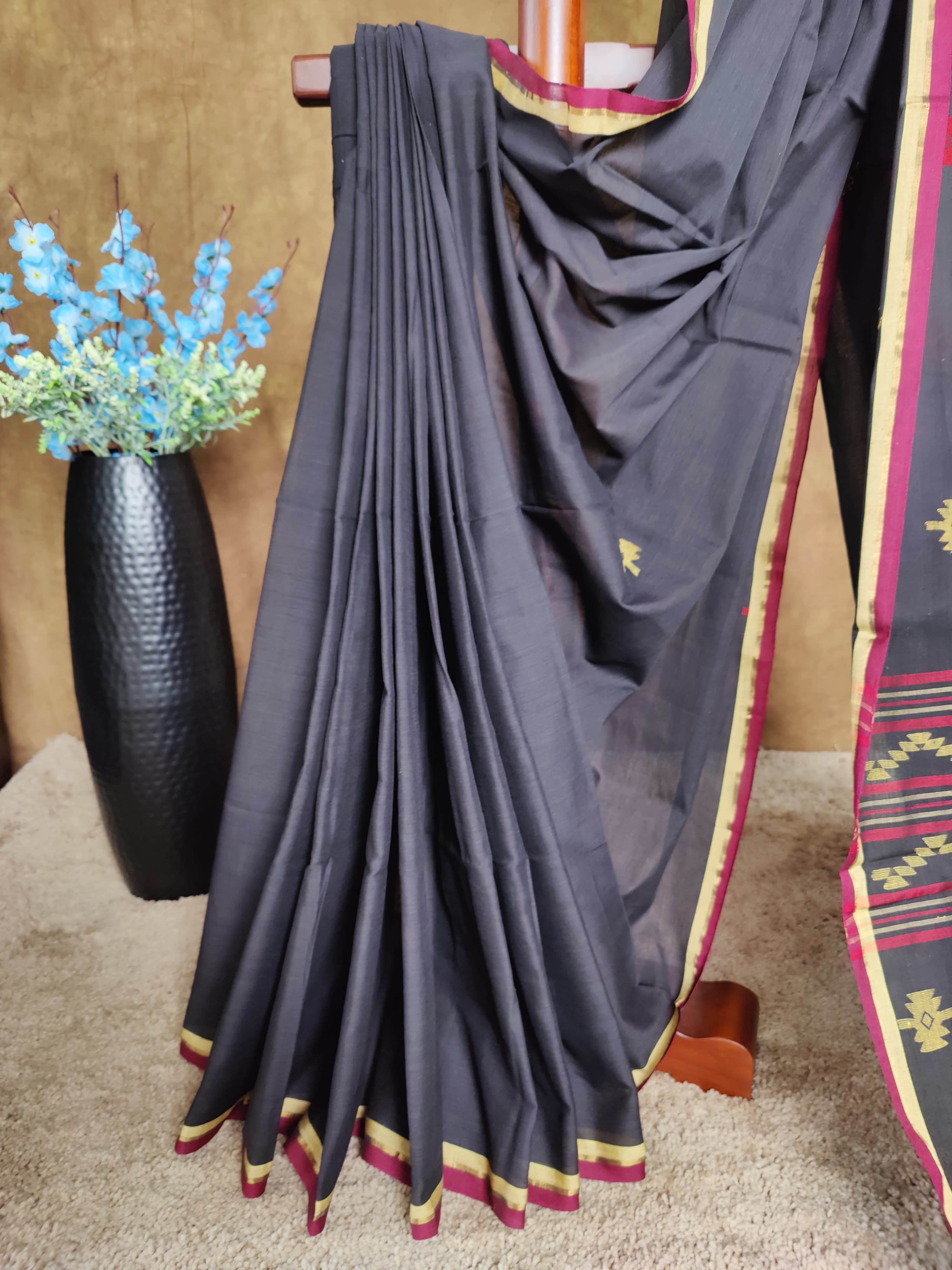 Black cotton Jamdani saree with red and yellow motifs