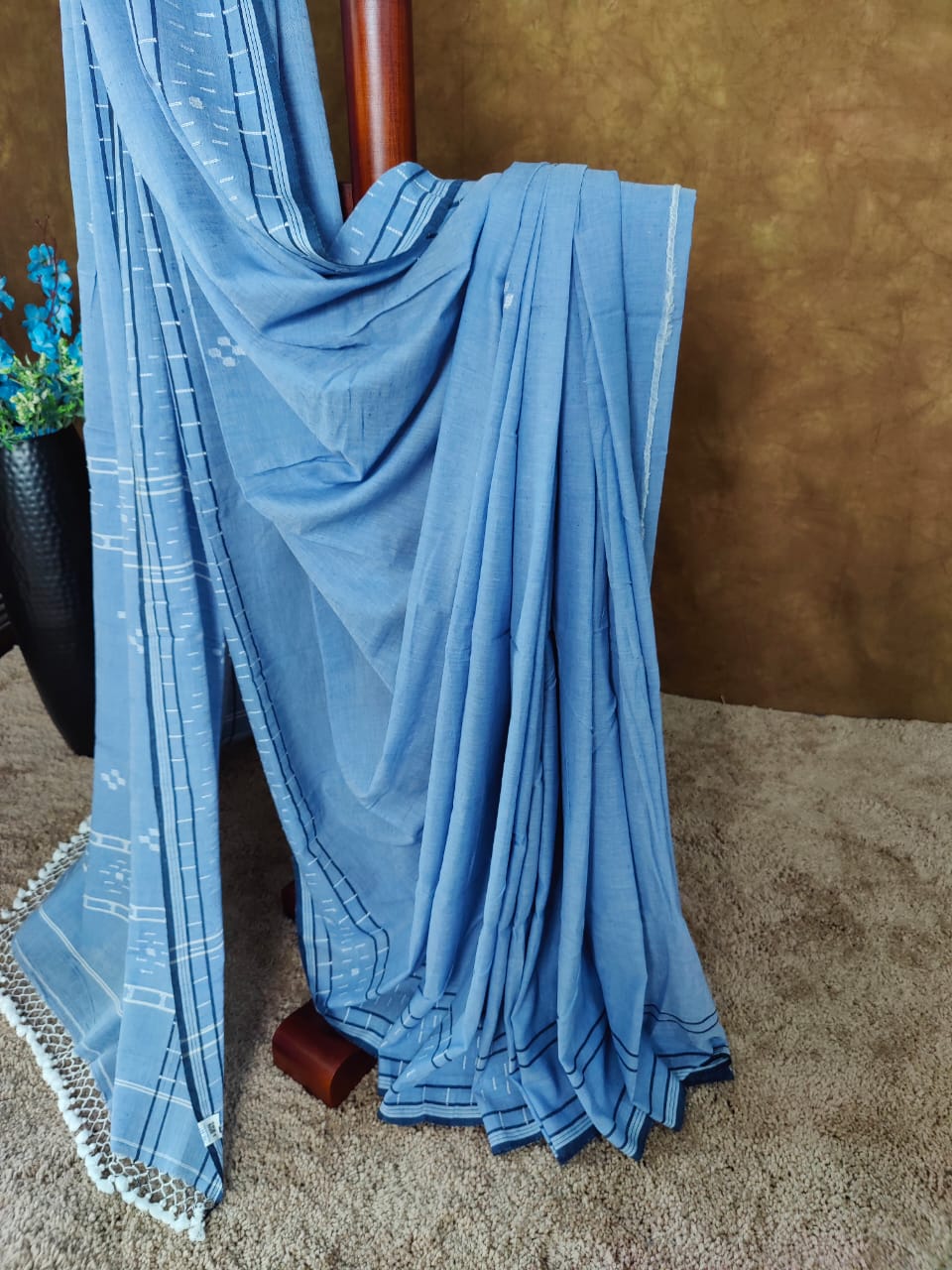 Sky blue cotton Jamdani saree with navy blue border